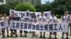 人权组织呼吁中国释放劳工人士和学生