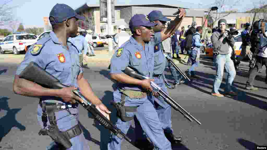 Police attempt to disperse protesters outside the University of Johannesburg in Soweto, ahead of a visit by U.S. President Barack Obama, June 29, 2013.