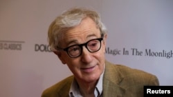 FILE - Director Woody Allen arrives for the premiere of his film "Magic in the Moonlight" in New York, July 17, 2014. 