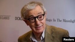 FILE - Director Woody Allen arrives for the premiere of his film "Magic in the Moonlight" in New York, July 17, 2014. 