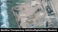 A satellite image released by the Asian Maritime Transparency Initiative at Washington's Center for Strategic and International Studies shows construction of possible radar tower facilities in the Spratly Islands in the disputed South China Sea.