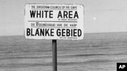 During Apartheid blacks and mixed race people were excluded from many places, for example, at the bayside like indicated on this sign-post. (06/23/76)(AP PHOTO)
