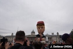 One of two Trump effigies protesters created to express their opposition to the U.S. leader, in London, June 4, 2019.