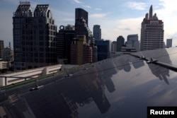 Solar panels are pictured on the roof of a building in Bangkok, Thailand, Aug. 9, 2017.