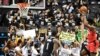 Pendukung Hong Kong Bagi-Bagikan Kaos pada Pertandingan Pertama NBA Musim Ini