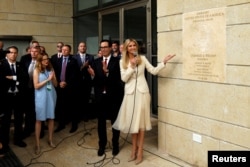 Senior White House Adviser Ivanka Trump and U.S. Treasury Secretary Steven Mnuchin stand next to the dedication plaque at the U.S. embassy in Jerusalem, during the dedication ceremony of the new U.S. embassy in Jerusalem, May 14, 2018.