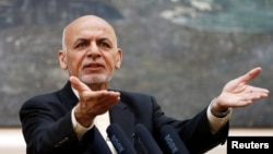 Afghan President Ashraf Ghani speaks during a news conference in Kabul, Afghanistan, July 15, 2018. A spokesman said Ghani is considering announcing an August cease-fire with the Taliban. 