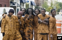 Members of Sierra Leone's Refugee All-Stars, from left, Black Nature, Reuben Koroma, Jah Sun, Ashade Pearce, Malam, Nico and Makengo, are photographed in New York, Oct. 24, 2006.