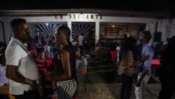 People dance to Congolese rumba played by the Bana OK music group at La Septante on September 24, 2021. (REUTERS/Hereward Holland)