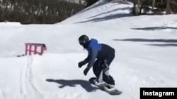 Snowboarder Brolin Mawejje trains in Utah in this undated image taken from a video on his Instagram account.