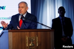 Israeli Prime Minister Benjamin Netanyahu speaks during a dedication ceremony of the "Assuta" hospital in Ashdod, Israel, Dec. 21, 2017.