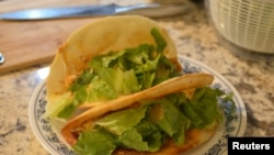 Chicken tacos made by Clint Parry are seen in Auburn Hills, Michigan, U.S., July 30, 2020. Picture taken July 30, 2020. Amanda Parry/Handout via REUTERS