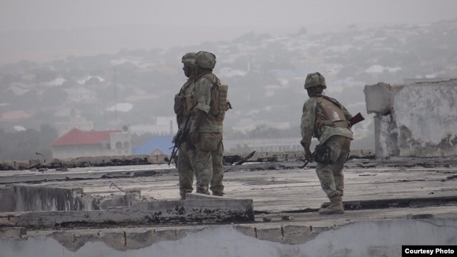 Gaashaan soldiers shortly after re-taking control of the Somali parliament building from al-Shabab fighters in on May 24, 2014. (Somalia Handout Photo)