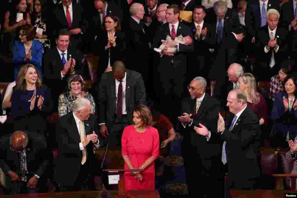 House Democratic leader Nancy Pelosi (D-CA) is applauded by U.S. Rep. Steny Hoyer (D-MD) and other members as she is nominated for House Speaker as the U.S. House of Representatives meets for the start of the 116th Congress on Capitol Hill in Washington, 