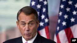 House Speaker John Boehner of Ohio speaks during a news conference on Capitol Hill in Washington, Thursday, Dec. 5, 2013.