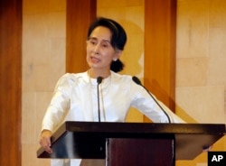 Myanmar State Counsellor Aung San Suu Kyi speaks at a memorial ceremony, Feb.26, 2017, in Yangon, Myanmar.