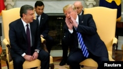 FILE - President Donald Trump and Uzbekistan President Shavkat Mirziyoyev meet at the White House, May 16, 2018.