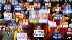 12일 한국 서울에서 열린 북한 로켓 발사 규탄 시위.