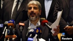 Hamas' leader in exile Khaled Meshaal speaks during a news conference about a cease-fire agreement between Israel and Gaza in Cairo November 21, 2012.