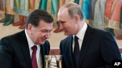 Rossiya prezidenti Vladimir Putin va O'zbekiston rahbari Shavkat Mirziyoyev. Arxiv. 