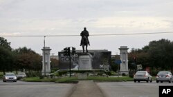 FILE - A statue of P.G.T. Beauregard is seen at the entrance to City Park at Esplanade Ave. in New Orleans, Sept. 2, 2015. 