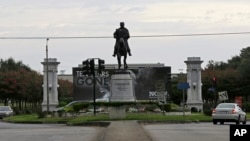 FILE - A statue of P.G.T. Beauregard is seen at the entrance to City Park at Esplanade Ave. in New Orleans, Sept. 2, 2015.
