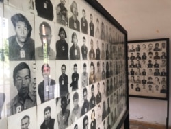 FILE - Photos of prisoners during the Khmer Rouge regime, displayed at the Tuol Sleng Genocide Museum in Phnom Penh, Cambodia. (Sun Narin/VOA Khmer)