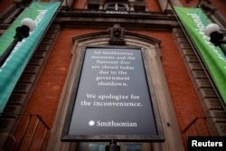 A sign outside of the Renwick Gallery stating that all Smithsonian museums are closed is seen on day 30 of a partial government shutdown, in Washington, U.S., Jan. 20, 2019.