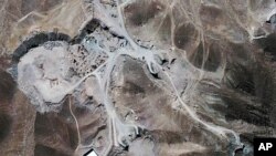 Satellite image shows a facility under construction inside a mountain located about 20 miles (32 kilometers) north northeast of Qom, Iran. (file)
