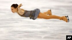 Adelina Sotnikova of Russia competes in the women's free skate figure skating finals at the Iceberg Skating Palace during the 2014 Winter Olympics, Feb. 20, 2014, in Sochi, Russia.
