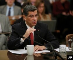 California Attorney General Xavier Becerra responds to a lawmakers question during during his confirmation hearing, Jan. 10, 2017.