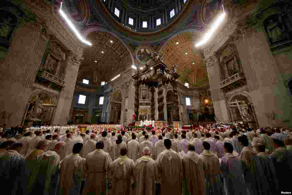 Pope Francis leads the Chrism Mass on Holy Thursday, during which sacred oils are blessed, at Saint Peter&#39;s Basilica at the Vatican.