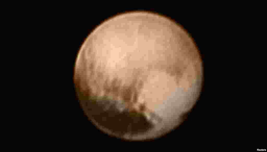 Pluto is pictured in this July 7, 2015, handout image from New Horizons' Long Range Reconnaissance Imager (LORRI).