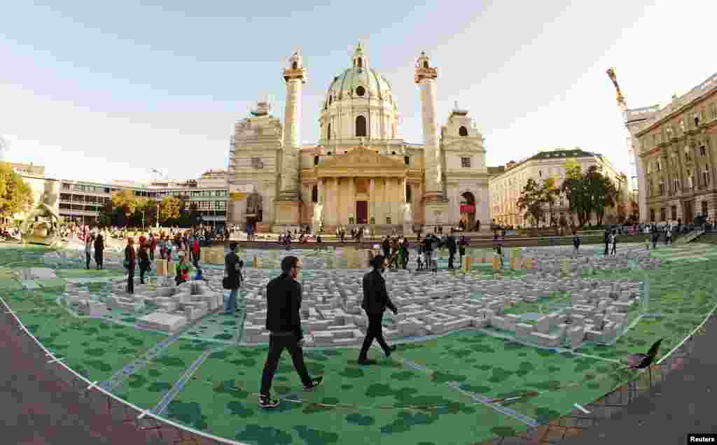 The arts project titled "Hypotopia", created by students of the Vienna University of Technology, is seen in front of the Karlskirche church in Vienna, Austria.