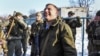 E. Ukraine Fighting Kills Soldiers, Civilians