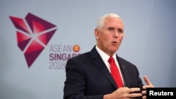 U.S. Vice President Mike Pence speaks during a news conference in Singapore, Nov. 15, 2018.