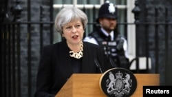 Britain's Prime Minister Theresa May speaks outside 10 Downing Street after an attack on London Bridge and Borough Market left 7 people dead and dozens injured in London, June 4, 2017. 