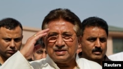 FILE - Pakistan's former President and head of the All Pakistan Muslim League (APML) political party Pervez Musharraf salutes as he arrives to unveil his party manifesto for the forthcoming general election at his residence in Islamabad, April 15, 2013. 