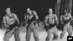 In this photo provided by Columbia Pictures via the Library of Congress, Harold Ramis, Dan Aykroyd, Bill Murray and Ernie Hudson (left to right) are shown in "Ghostbusters."