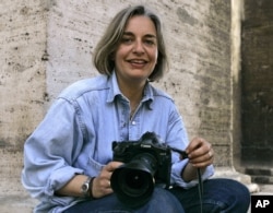 FILE - Associated Press photographer Anja Niedringhaus poses for a photograph in Rome in April 2005.