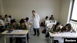 FILE - Children attend a class at Fatih College in Istanbul, Turkey. The 640-pupil school is run by followers of Fethullah Gulen.