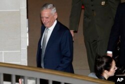 Defense Secretary Jim Mattis leaves a closed door meeting that he attended with Secretary of State Mike Pompeo and Senators about Saudi Arabia, Nov. 28, 2018, on Capitol Hill in Washington.