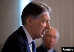 FILE - British Foreign Secretary Phillip Hammond.