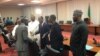 Patrice Talon et les représentants de l'opposition après leur rencontre, Bénin, le 25 février 2019. (VOA/Ginette Fleure Adandé) 