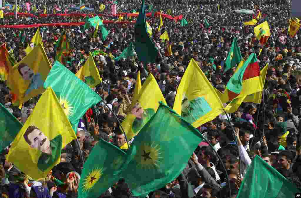Thousands of supporters demonstrate as jailed Kurdish rebel leader Abdullah Ocalan called for a cease-fire, Diyarbakir, Turkey, March 21, 2013.