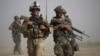 A U.S. Marine and an Afghan soldier are seen on joint patrol in Helmand province, southern Afghanistan (file photo).