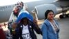 Chile Sends Planeload of Haitians Home