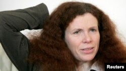 FILE - Russian journalist Yulia Latynina speaks during an interview with Reuters in Moscow.