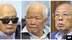 FILE - Former Khmer Rouge second-in-command Nuon Chea, former President Khieu Samphan and former Foreign Minister Ieng Sary (L-R) attend their trial at the Extraordinary Chambers in the Courts of Cambodia (ECCC), Nov. 21, 2011.