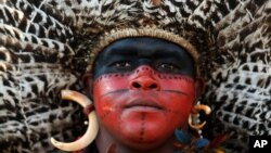 A Pataxo Indian, of Brazil, attends the World Indigenous Games in Palmas, Brazil, Oct. 29, 2015. 